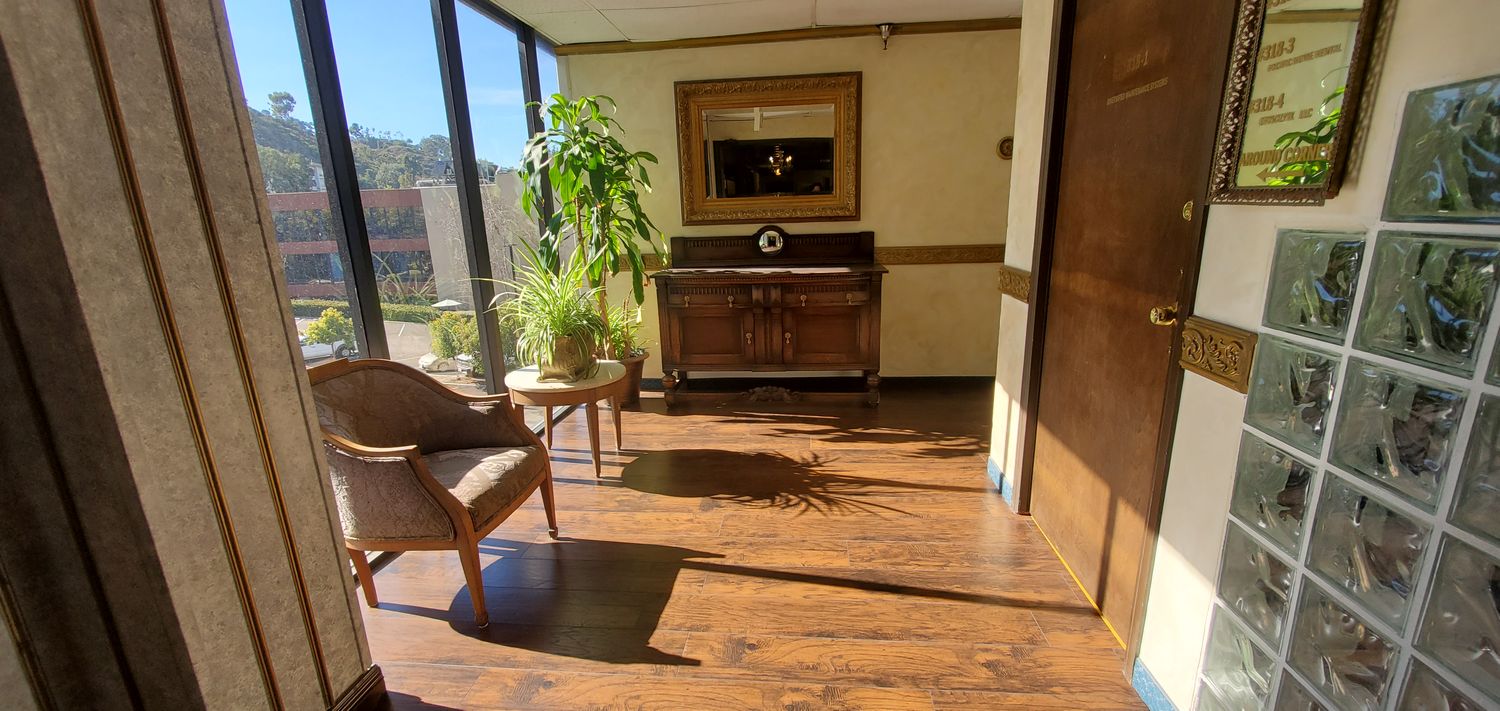 TILE ENTRY AND RECEPTION, 3 OFFICES AND LARGER ROOM.